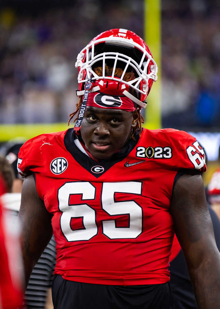 Jan 9, 2023; Inglewood, CA, USA; Georgia Bulldogs offensive lineman Amarius Mims (65) against the TCU Horned Frogs during the CFP national championship game at SoFi Stadium. Mandatory Credit: Mark J. Rebilas-USA TODAY Sports